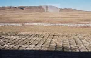 Barrier fences beside the track.